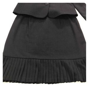Pleated midi A-line work skirt with bottom pleating from Briggs New York.